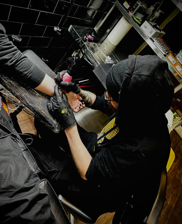 Mikey T, neo-traditional blackwork and gothic tattooist at Wotto's Ink