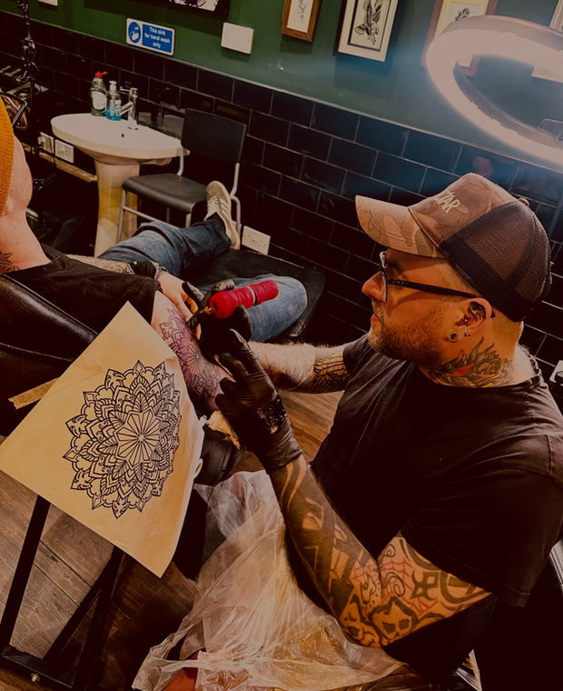 Paul Mckenzie, traditional and neo-traditional tattooist at Wotto's Ink