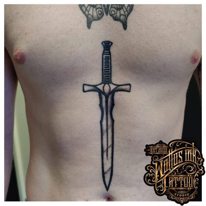Dark blackwork tattoo by Mikey T
