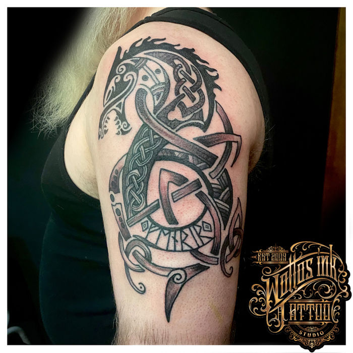 Detailed black and grey Fenrir wolf tattoo by Paul Mckenzie at Wotto's Ink